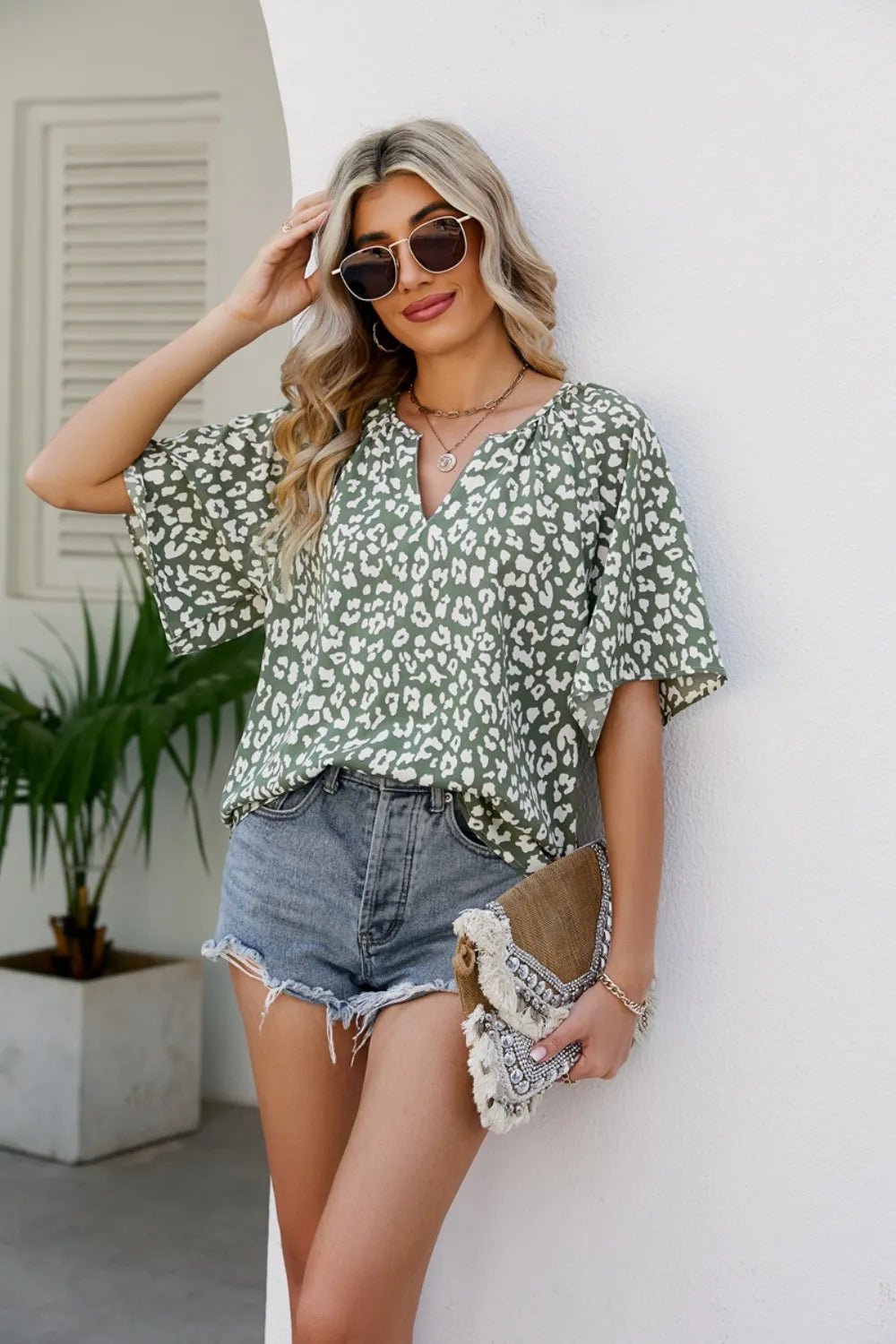 Leopard Notched Half Sleeve Blouse - TheMomCo.