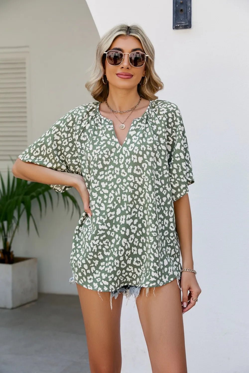 Leopard Notched Half Sleeve Blouse - TheMomCo.