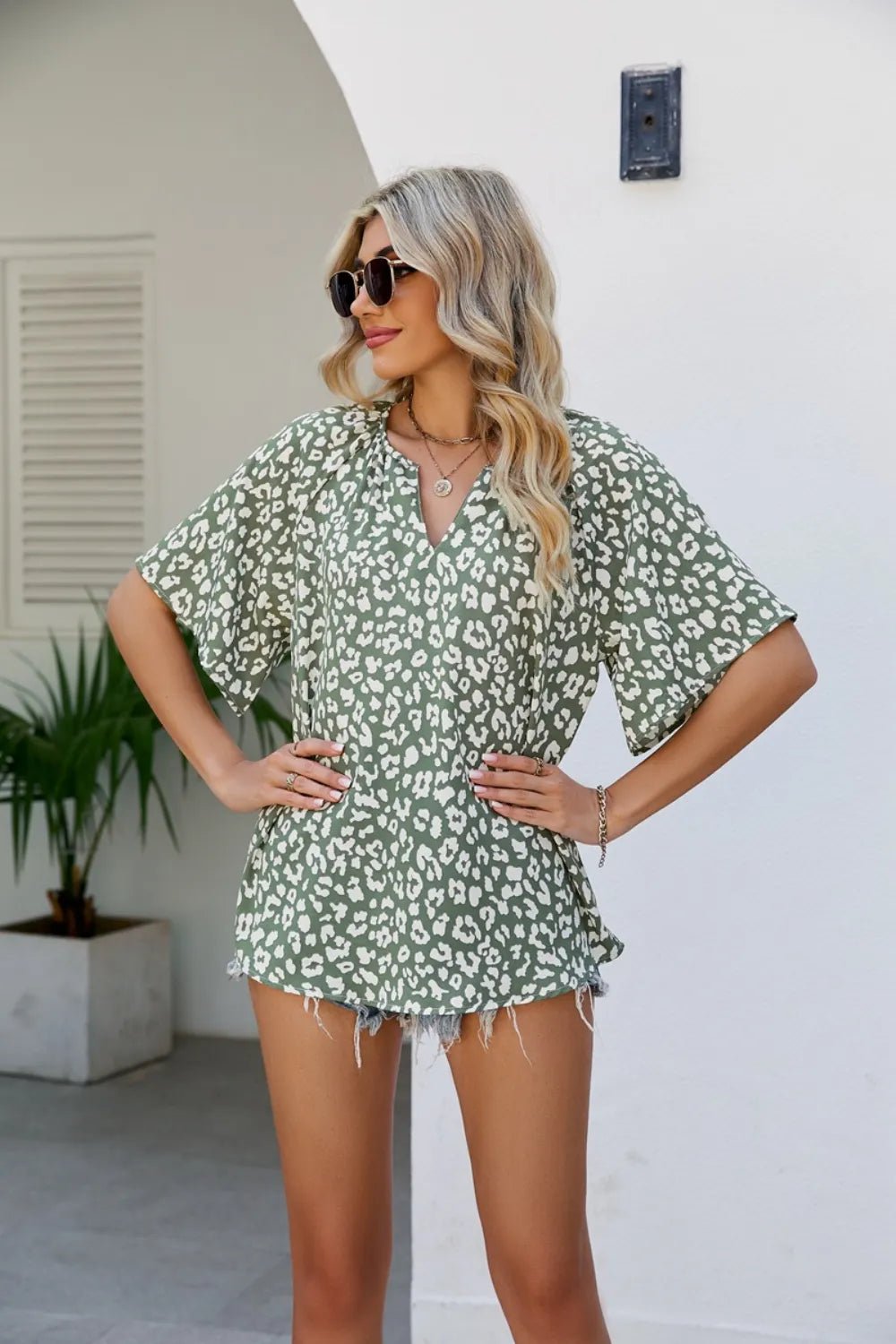 Leopard Notched Half Sleeve Blouse - TheMomCo.
