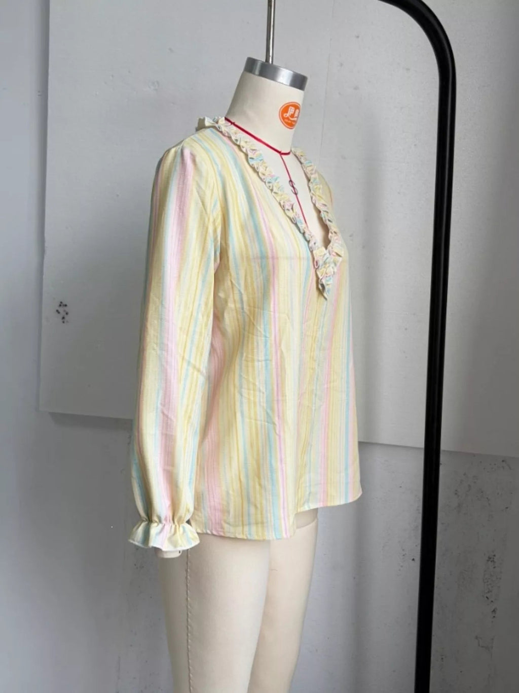 Striped Ruffle-Trim V-Neck Blouse - TheMomCo.